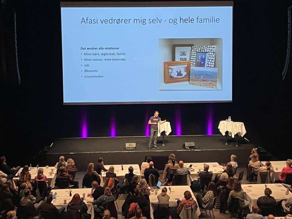 Image of Yago during a lecture. Taking to a crowd